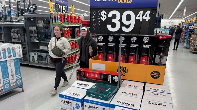 Walmart is offering up to 50% off select toys, electronics and other popular gift items beginning Nov. 14 including Lego, televisions and Apple products. AP FILE