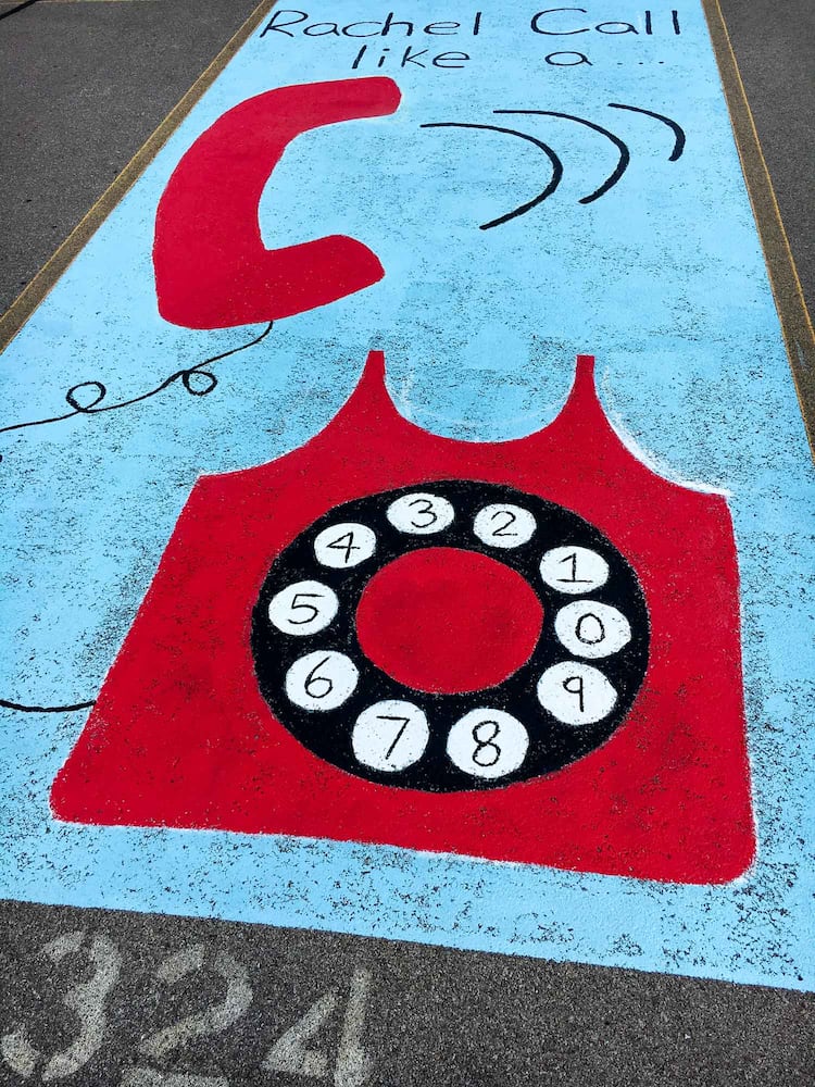 PHOTOS Lakota East seniors paint parking spots