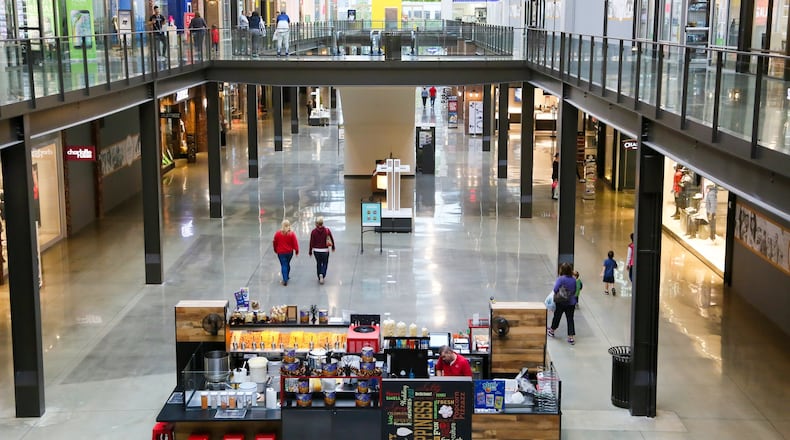 Shoppers walk through the Foundry at Liberty Center, Thursday, Oct. 20, 2016. Liberty Center is celebrating their one year anniversary this weekend. GREG LYNCH / STAFF