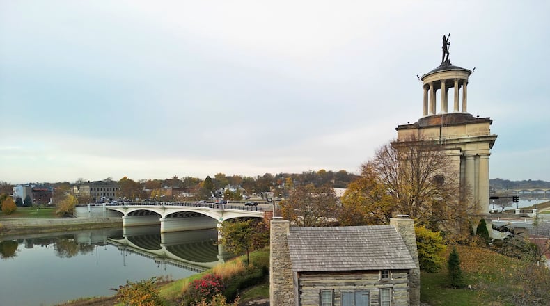 Chris Maraschiello, a history teacher at Hamilton Freshman School, is docent for the historic log house on S. Monument Ave. next to the Soldiers, Sailors and Pioneers Monument in Hamilton. Maraschiello has been researching the history of the house and discovered it was built in 1817. NICK GRAHAM/STAFF