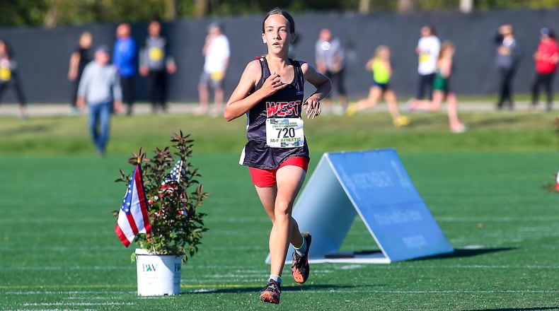 Lakota West High School freshman Evelyn Prodoehl placed eighth in the Division I girls race at the at the Ohio High School Athletic Association Cross Country Championships at Fortress Obetz. Michael Cooper/CONTRIBUTED