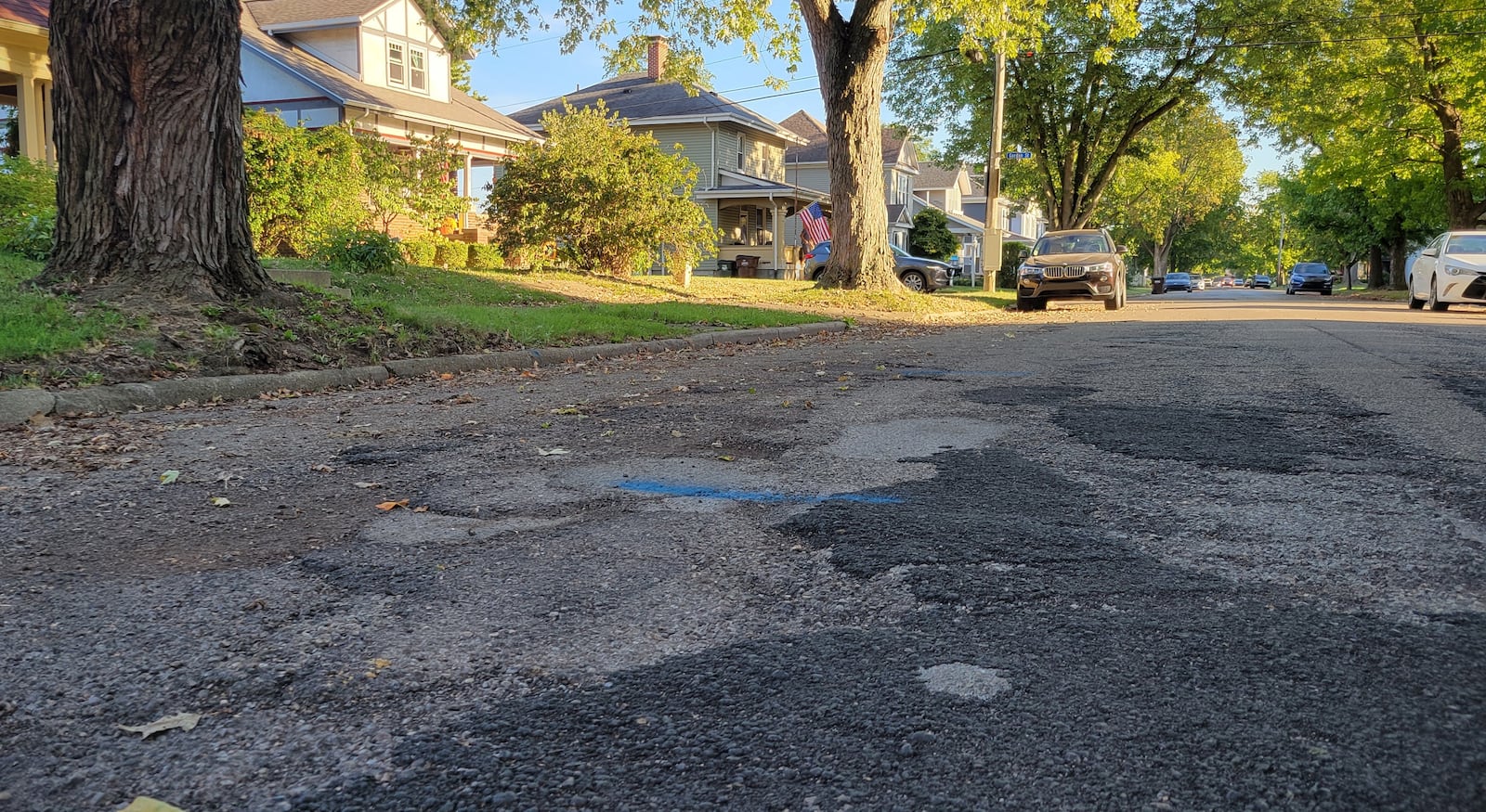 A section of road along King Street in Xenia has been patched many times over the years, to the point residents say they avoid driving over it. Xenia voters will consider a levy this fall intended to fix streets like this one. LONDON BISHOP / STAFF