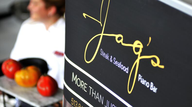 Executive Chef Michelle Brown of Jag’s Steak & Seafood in West Chester Twp. performs a cooking demonstration on Tuesday at the Lindner Family Tennis Center during the Western & Southern Open in Mason.