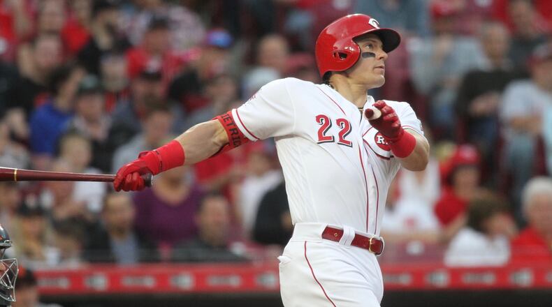 The Reds’ Derek Dietrich hits a home run against the Giants on Friday, May 3, 2019, at Great American Ball Park in Cincinnati. David Jablonski/Staff
