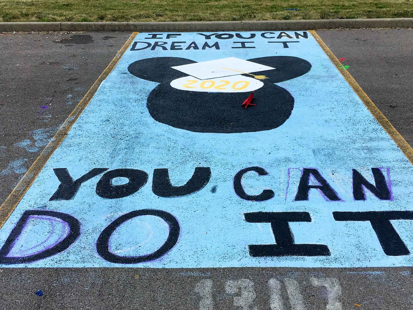 PHOTOS Lakota East seniors paint parking spots