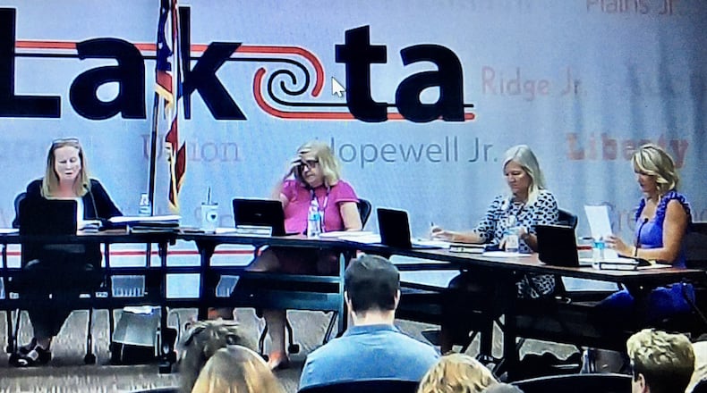 Despite her opposition, Lakota’s school board passed a revised visitation policy Monday evening that member Darbi Boddy, right, claimed was designed to curtail her access to school buildings. The Lakota Board of Education voted 4-1, with Boddy the lone opposition, to amend its school building visitation policy adding more detailed procedures to how visitors – including school board members - are to proceed with future tours of Lakota’s schools. (Photo By Michael D. Clark\Journal-News)