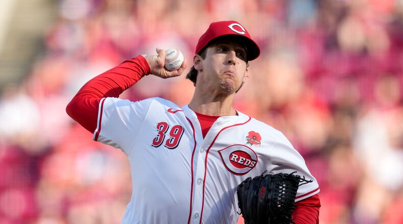 Cincinnati Reds pitcher Lucas Sims throws during the ninth inning of a baseball game against the St. Louis Cardinals, Monday, May 27, 2024, in Cincinnati. (AP Photo/Jeff Dean)