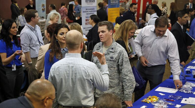A job fair at the Hope Hotel and Conference Center at Wright-Patterson Air Force Base in 2016. TY GREENLEES / STAFF FILE PHOTO