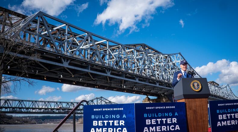 FILE -- President Joe Biden delivers remarks at the Brent Spence Bridge, which connects Kentucky to Ohio, in Covington, Ky., Jan. 4, 2023. Biden has relished the unveiling of new infrastructure projects like a long-awaited replacement for the bridge. (Pete Marovich/The New York Times)