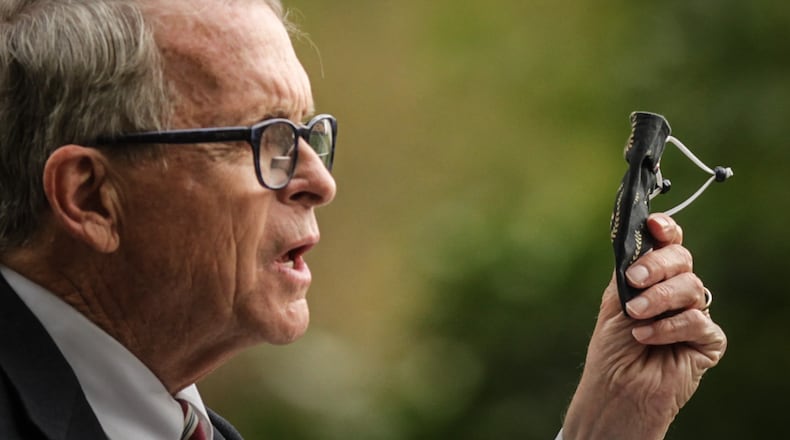 Ohio Gov. Mike DeWine talks to the press Friday October 9, 2020 at the Patterson Homestead on Brown St. in Dayton. DeWine traveled around Ohio on Friday because he was worried about the recent COVID-19 uptick. JIM NOELKER/STAFF