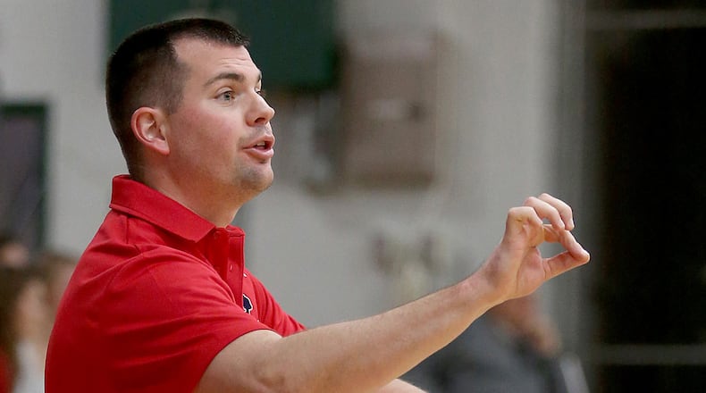 Talawanda coach Eddie Glaser instructs his team during the season opener at Badin on Nov. 27. CONTRIBUTED PHOTO BY E.L. HUBBARD