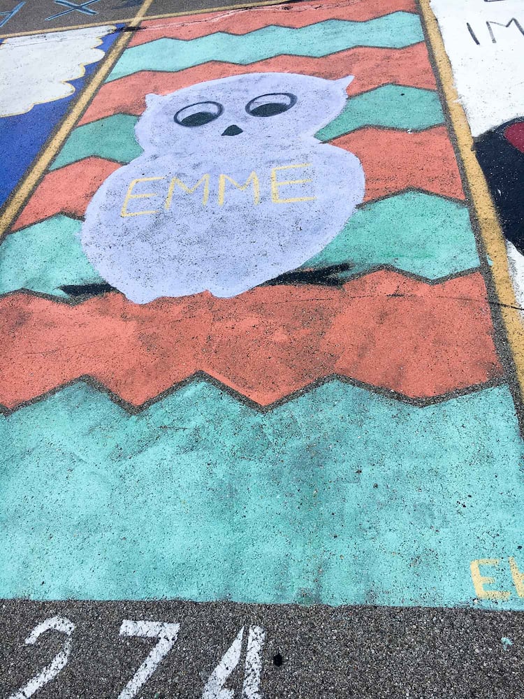 PHOTOS Lakota East seniors paint parking spots