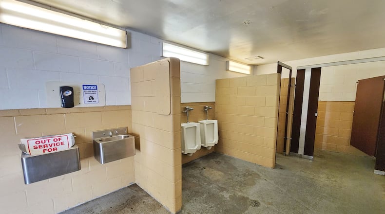 The city of Middletown is spending about $246,000 to upgrade the two restrooms at Smith Park, the city's largest and most visited park. The remodel work will include replacement of all fixtures (sinks, toilets, urinals), doors, lighting, accessories (grab bars, mirrors, soap dispensers, hard dryers, etc.) to meet ADA requirements, painting of walls and new ceiling, applying an epoxy coating to the floors and electrical upgrades including installation of electric wall heaters, according to city officials. NICK GRAHAM/STAFF
