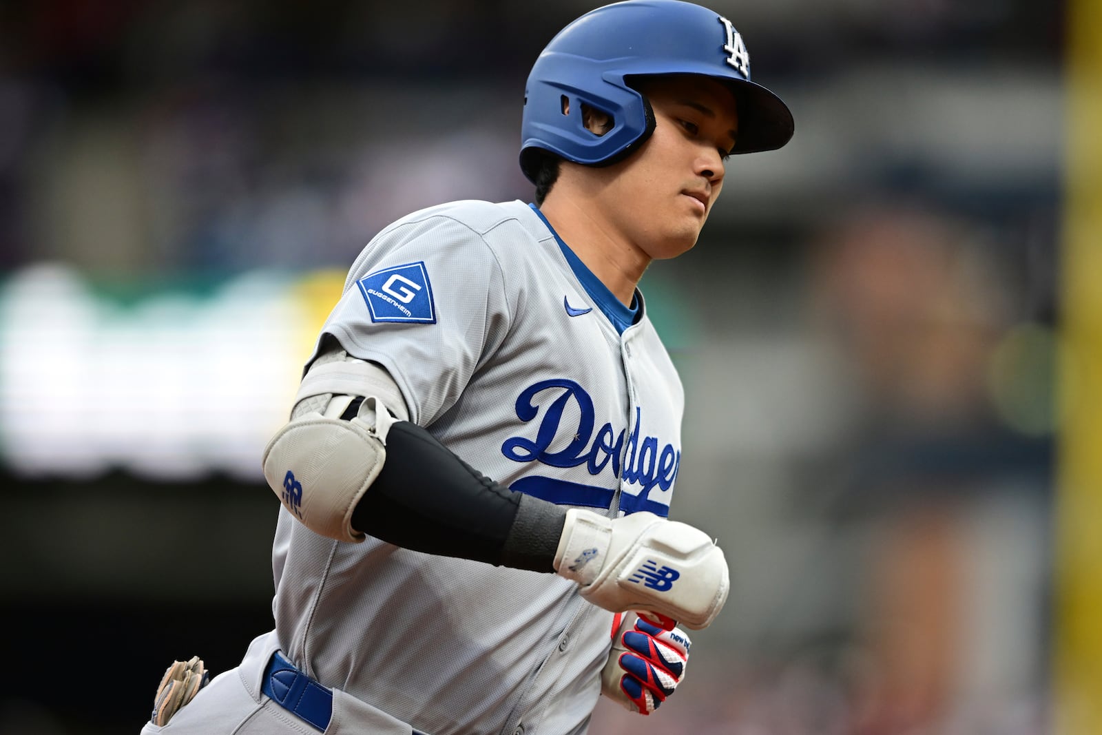 Los Angeles Dodgers' Shohei Ohtani runs the bases after hitting a two run home run off Cleveland Guardians starting pitcher Tanner Bibee during the fourth inning of a baseball game, Tuesday, May 27, 2025, in Cleveland. (AP Photo/David Dermer)