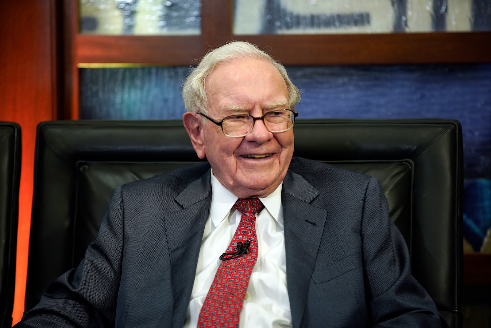 FILE - Berkshire Hathaway Chairman and CEO Warren Buffett smiles during an interview in Omaha, Neb., May 7, 2018, with Liz Claman on Fox Business Network's "Countdown to the Closing Bell". (AP Photo/Nati Harnik, File)