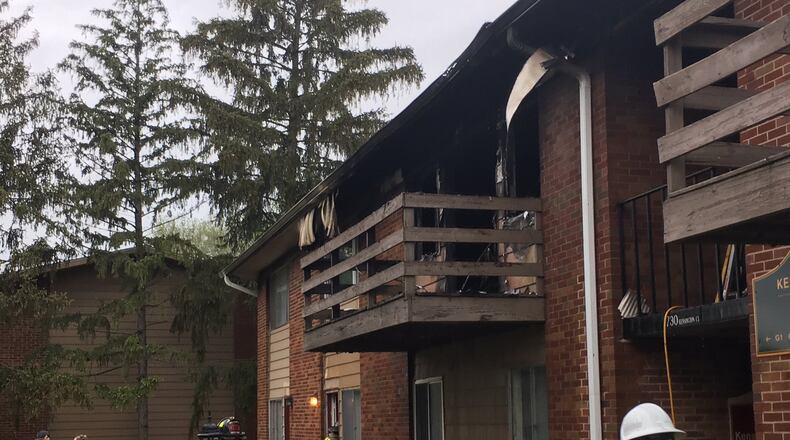 Middletown firefighters were assisted by fire crews from Monroe and Franklin to put out a fire in an eight-unit apartment building at the Kensington Ridge Apartments Monday evening. No injuries were reported but 20 to 22 people were displaced as a result of the fire damage. ED RICHTER/STAFF