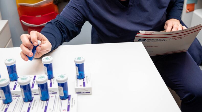 FILE — The abortion pills mifepristone and misoprostol are packaged for mailing to patients, in Ridgewood, N.J. on April 18, 2023. A growing share of abortions is now being administered through telemedicine, with clinicians prescribing mail-order abortion pills after online consultations, according to the first nationwide count of telehealth abortions in the U.S. medical system. At least one in six abortions, around 14,000 a month, was conducted via telehealth from July through September, the most recent months with available data. (Jackie Molloy/The New York Times)