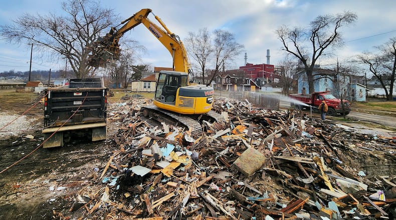 A home on North Second Street in Hamilton's North End was razed on Monday, Feb. 6, 2023. This house was next to the former Speedy's Drive-Thru. Buildings on properties along North Second and North Third streets will be demolished over the next few weeks. NICK GRAHAM/STAFF