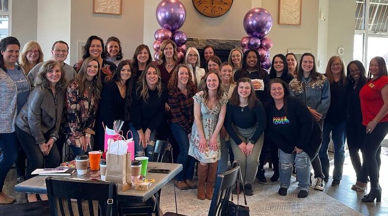 Local entrepreneur Maygan Ward founded “The GROWmunity” to foster other entrepreneurs in the area. Shown here is a woman's entrepreneur meetup at Coffee Cup Overflowing in Fairfield Twp. CONTRIBUTED