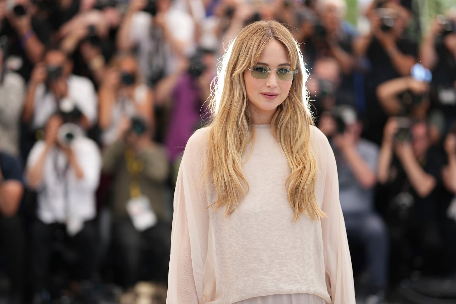 Jennifer Lawrence poses for photographers at the photo call for the film 'Die, My Love' at the 78th international film festival, Cannes, southern France, Sunday, May 18, 2025. (Photo by Scott A Garfitt/Invision/AP)