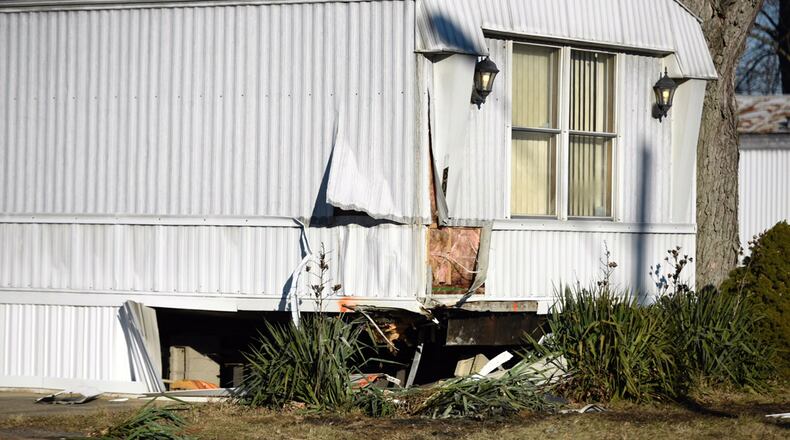 The driver of a vehicle that crashed into this mobile home in the Riverside Village Trailer Park was pronounced dead at the scene. NICK GRAHAM/STAFF