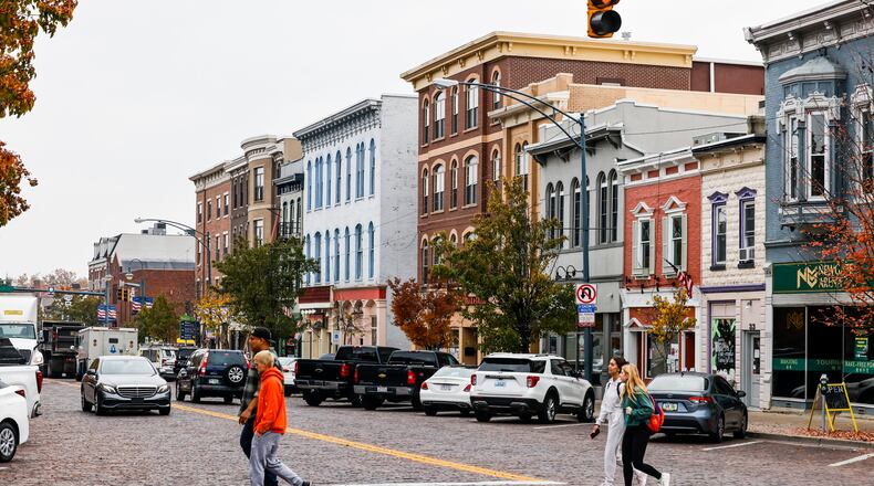 High Street in Oxford is always humming with people and vehicles as it is a main thoroughfare in the Butler County city. Annually, its Kiwanis club selects people as its Citizen of the Year and Citizen of the Years. FILE PHOTO