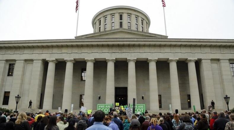 ECOT supporters held a rally at the Ohio Statehouse in Columbus on May 9, 2017. The state is holding back additional funding for ECOT, an online school facing attendance questions. COLUMBUS DISPATCH