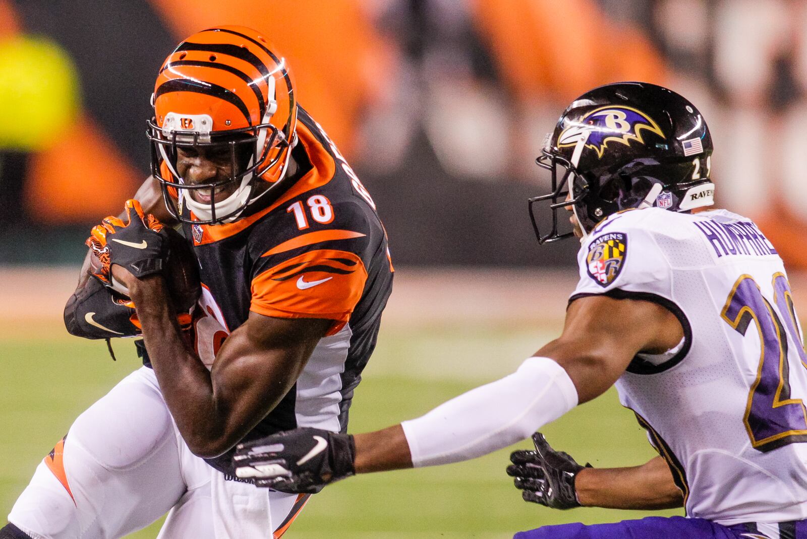 Cincinnati Bengals wide receiver A.J. Green carries the ball in for a touchdown during their game against the Baltimore Ravens Thursday, Sept. 13 at Paul Brown Stadium in Cincinnati. The Cincinnati Bengals defeated the Baltimore Ravens 34-23. NICK GRAHAM/STAFF