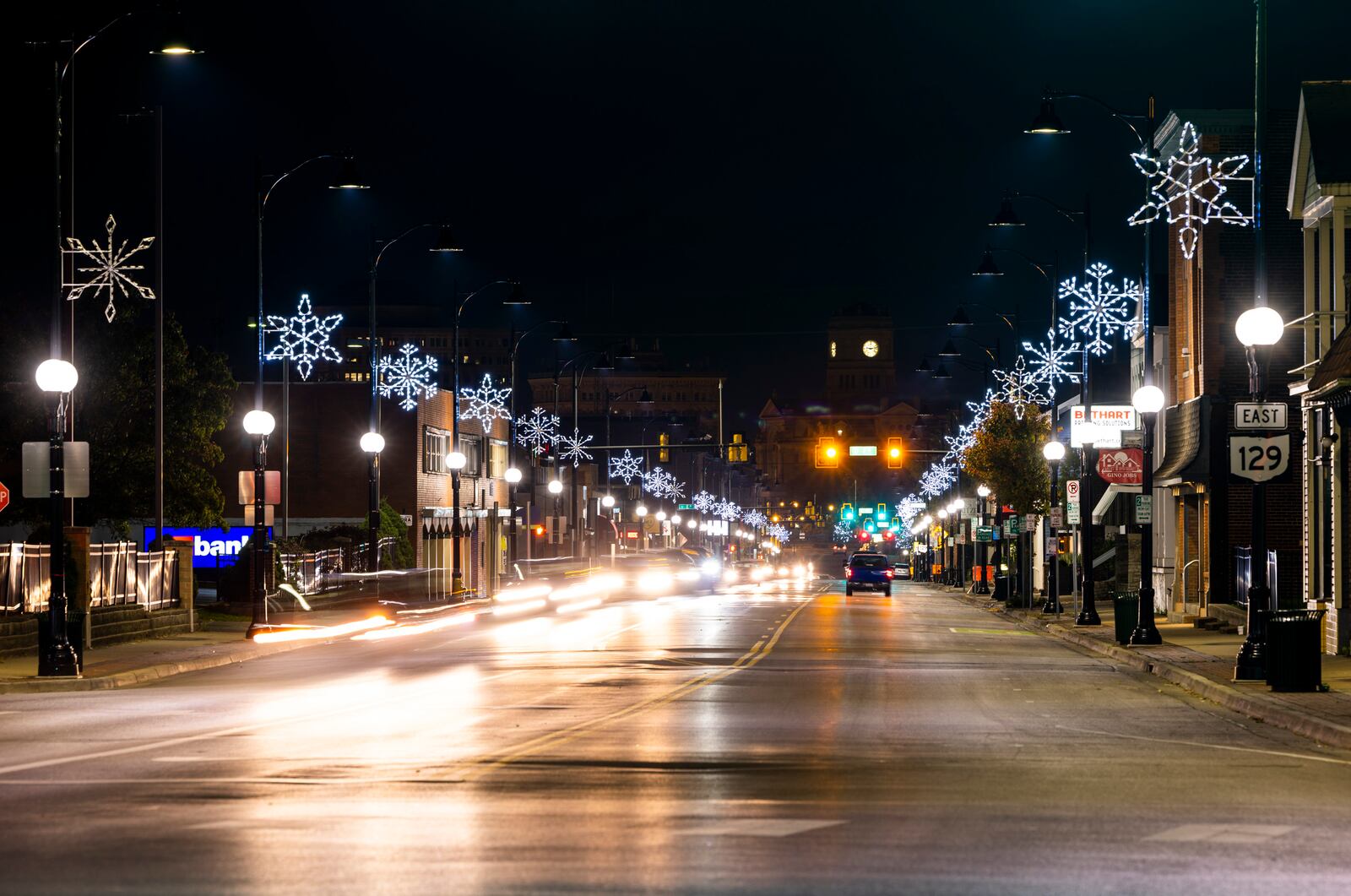 Holiday snowflake lights have been placed and illuminated on the light poles along Main Street in Hamilton Wednesday, Nov. 3, 2021. NICK GRAHAM / STAFF
