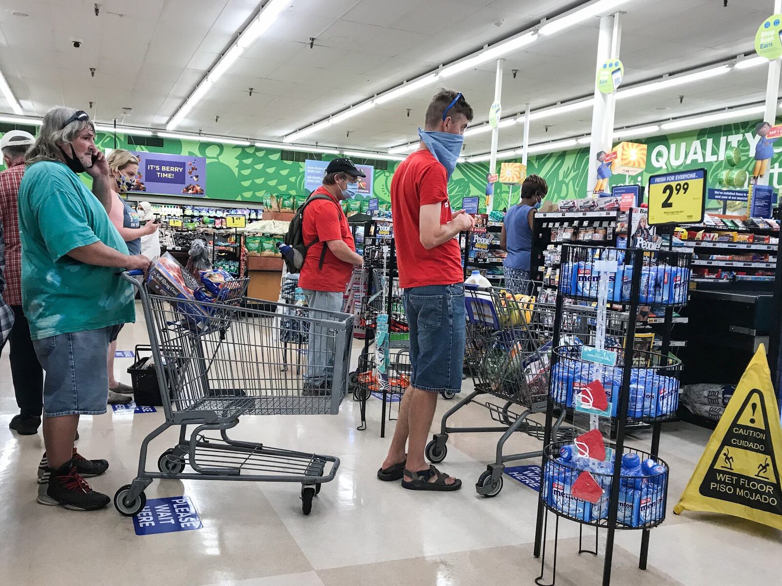 People wait in line at the Krogers on Wayne Ave. Thursday July 9, 2020. The U.S. Census Bureau looked at how Americans spent their stimulus checks. JIM NOELKER/STAFF