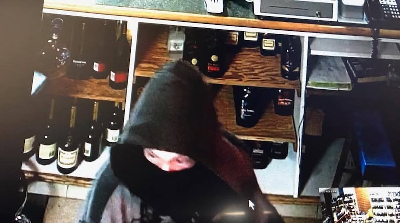 Security cameras at Noonan’s liquor store in Hamilton captured a suspected thief and their car from Wednesday’s break-in. CONTRIBUTED