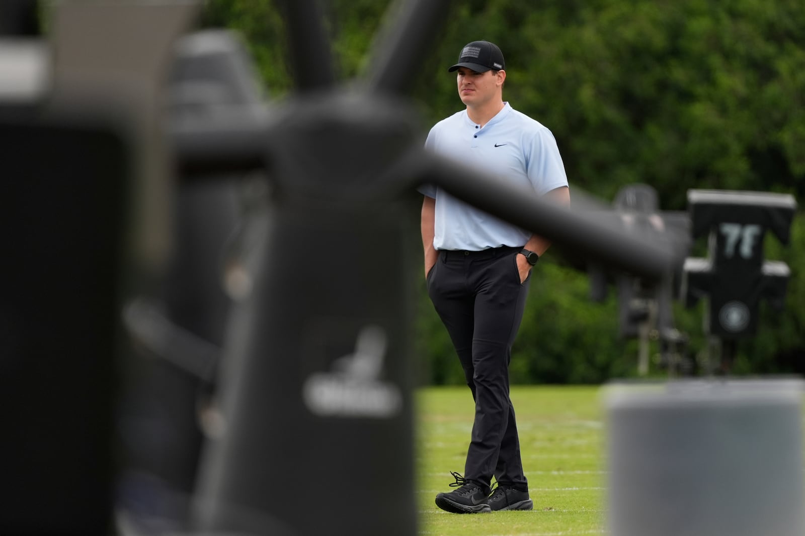 Cincinnati Bengals defensive end Trey Hendrickson observes NFL football practice on Tuesday, May 13, 2025, in Cincinnati. (AP Photo/Carolyn Kaster)