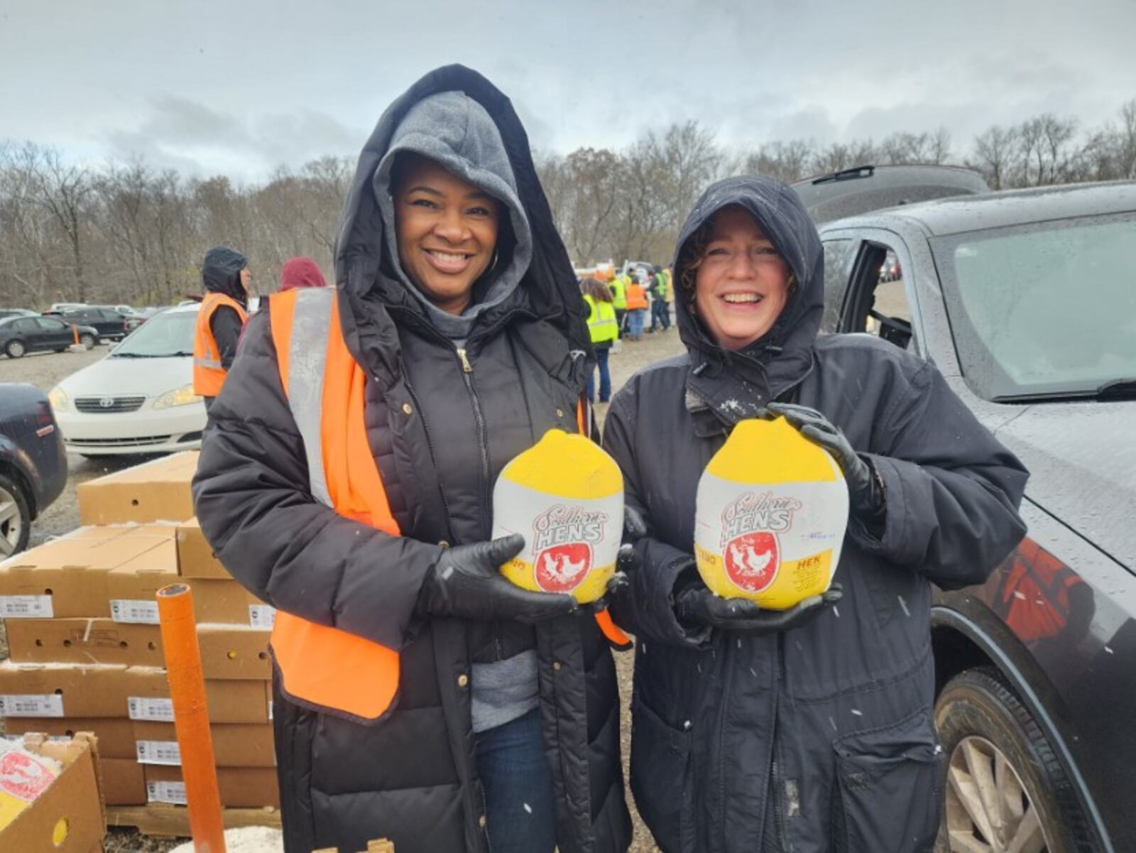 The Foodbank volunteers handing out Cornish hens to families at its Thanksgiving Mass Food Distribution. THE FOODBANK?CONTRIBUTED