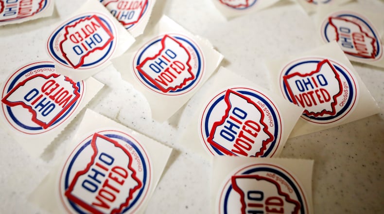 "I voted" stickers are displayed at the exit of the polling site at Toth Elementary School, Tuesday, Aug. 8, 2023 in Perrysburg, Ohio. Ohioans are voting on Issue 1. Voters in Ohio on Tuesday are weighing whether to make it more difficult to change the state's constitution, a decision that will have national implications in the debate over the future of abortion rights in the United States. (Kurt Steiss/The Blade via AP)
