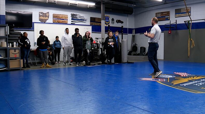 Middletown City Schools freshmen, sophomores and seniors had an "experiential learning day" that consisted of stops at local businesses and post-secondary education options. Here they visited Butler Tech to learn about fields such as law enforcement. MARCH PRICE/WCPO
