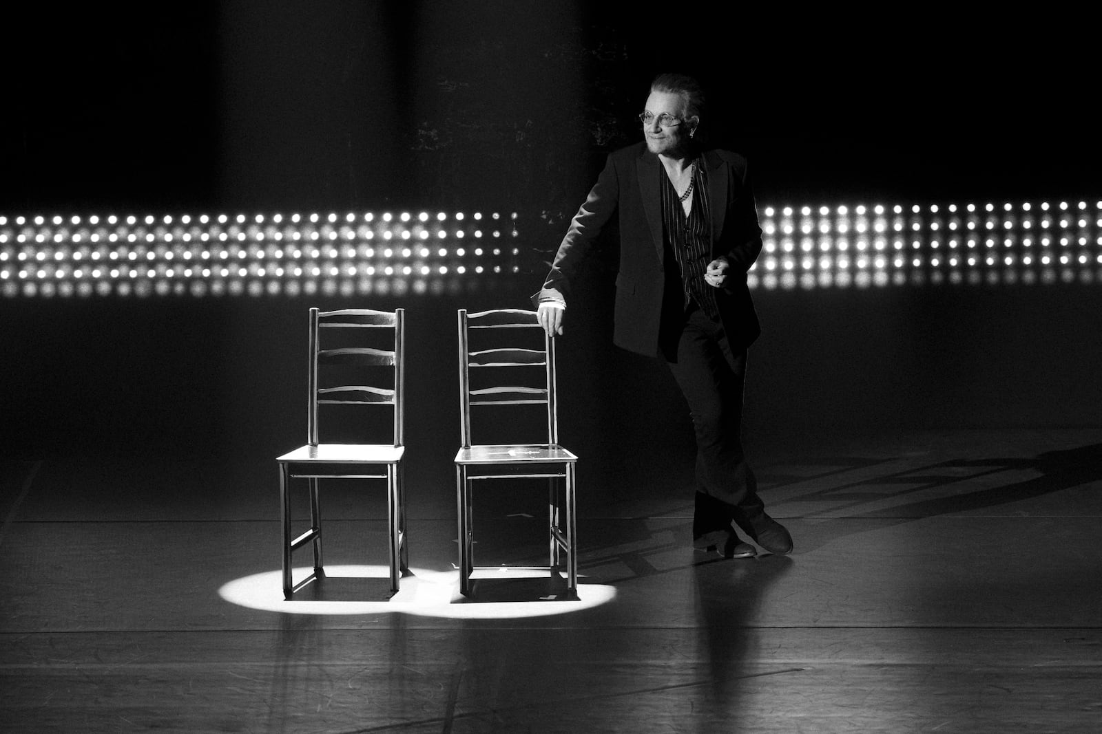 This image released by Apple TV+ shows Bono, lead singer of the Irish rock band U2, in a scene from the documentary “Bono: Stories of Surrender." (Apple TV+ via AP)