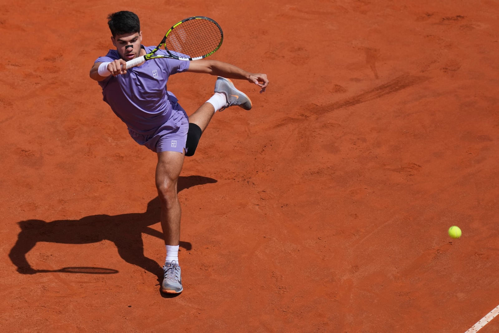Spain's Carlos Alcaraz in action against Serbia's Dusan Lajovic during the Italian Open tennis tournament in Rome, Friday May 9, 2025. (Alfredo Falcone/LaPresse via AP)