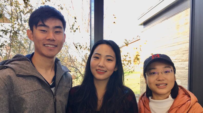 This week Miami University was one of only five schools nationally to win a prestigious award for inclusion programs for international students. Three of Miami’s 3,177 foreign-born students - (left to right) Diwen Chen from China; Woojin Lee, South Korea and Jing Jing Luo, China, say the national acclaim for Miami is deserved for its many and comprehensive programs designed to accommodate the needs of students like themselves. (Photo By Michael D. Clark/Journal-News)