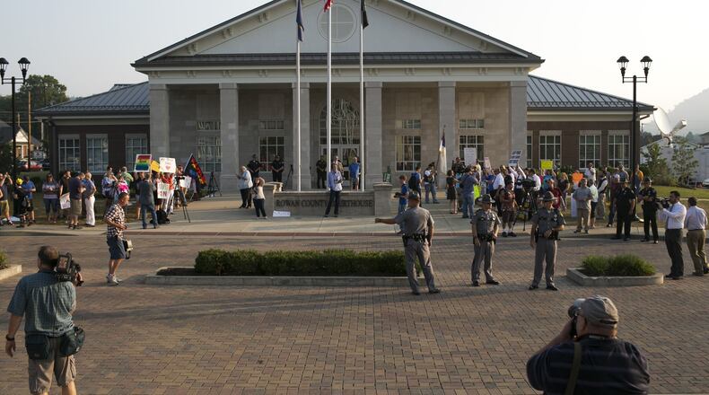 Protesters and supporters of same-sex marriage rights gather Sept. 4 outside the county courthouse in Morehead, Ky. (Maddie McGarvey/The New York Times)