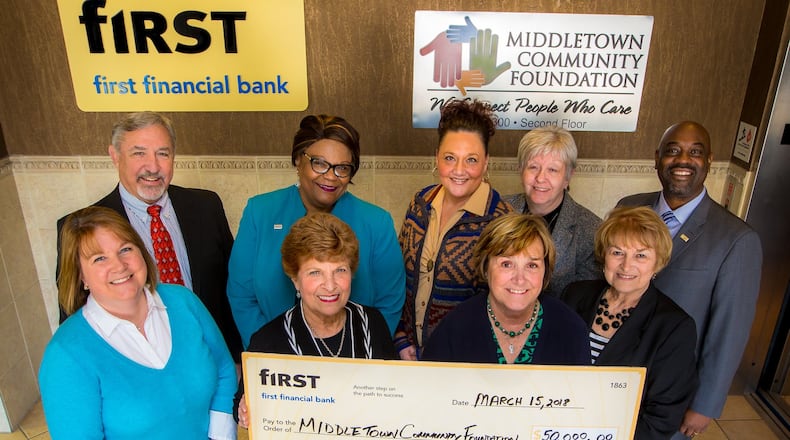 First Financial donated $50,000 to Middletown Community Foundation’s READY! Campaign. Back row, from left: Dan Sack, Robie Suggs, Amy Berlean, JoAnn Wagner and Roddell McCullough; Front row, from left: Kristen Mulligan, Carole Schul, Patricia Gage, and Elaine Garver. CONTRIBUTED
