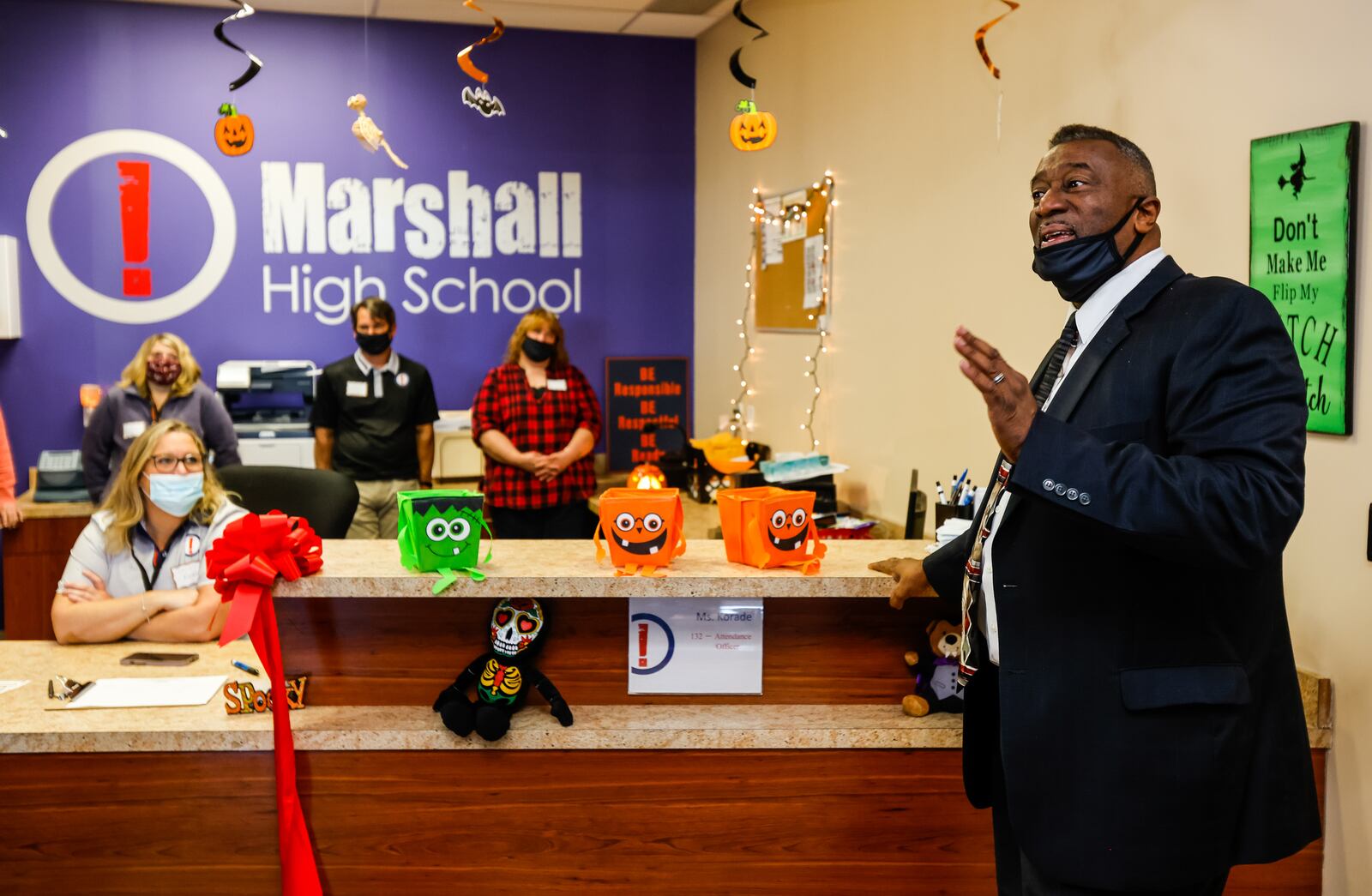 Principal Chuck Hall speaks during a ribbon cutting Tuesday, Oct. 26, 2021 for the new career technology wing of Marshall High School in Middletown. The new space includes classes in healthcare, manufacturing, construction and entrepeneurial and business. NICK GRAHAM/STAFF