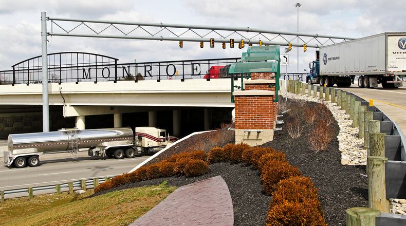 A new 100-room hotel and retail center are the first phase of a firm’s plans to develop 40 acres for commercial use just off of Interstate 75’s Monroe exit.