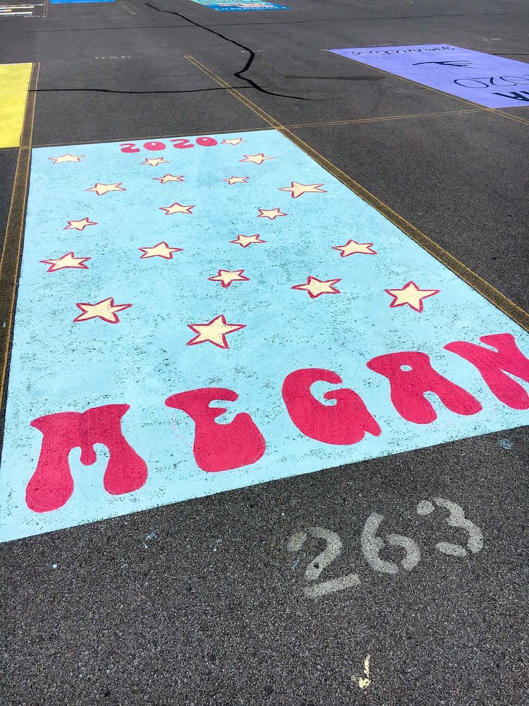 PHOTOS Lakota East seniors paint parking spots