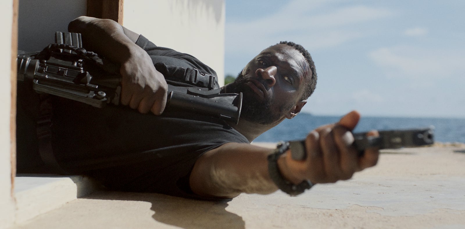 This image released by Lionsgate shows Omar Sy in a scene from "Shadow Force." (Lionsgate via AP)