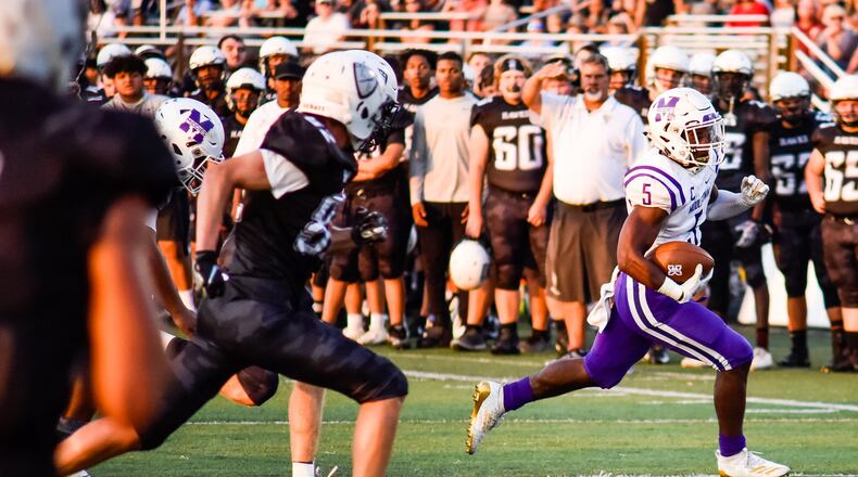 Middletown's Josh Bryant carries the football during their game against Lakota East Friday, Sept. 20, 2019 at Lakota East High School in Liberty Township. Lakota East defeated Middletown 21-9. NICK GRAHAM/STAFF