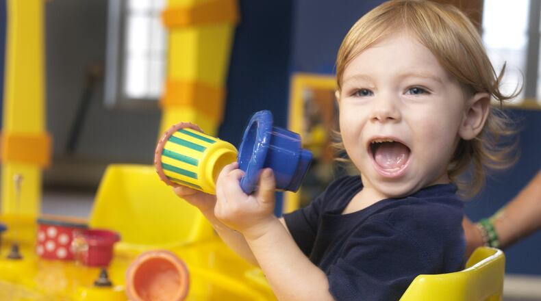 A youngster enjoys the Kidspace area at COSI, a major attraction in Columbus. CONTRIBUTED