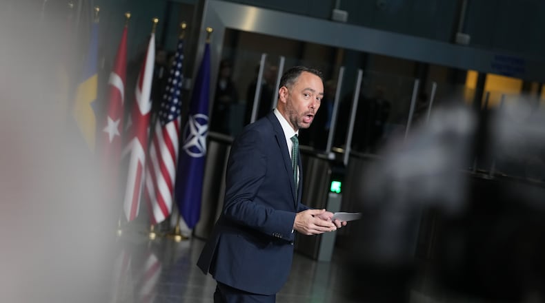 Belgium's Foreign Minister Maxime Prevot speaks with journalists as he arrives for a meeting of NATO foreign ministers at NATO headquarters in Brussels, Wednesday, Dec. 3, 2025. (AP Photo/Virginia Mayo)