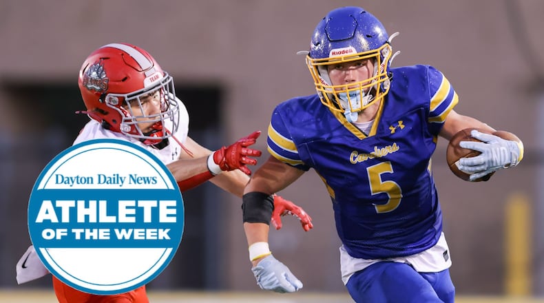 Lehman Catholic High School senior Evan O'Leary runs the ball during their game against Dayton Northridge earlier this season. BRYANT BILLING / STAFF