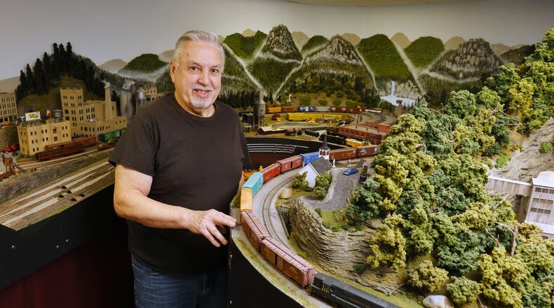 Butler County Common Pleas Court Judge Noah E. Powers II enjoys working on his model train display in his free time. NICK GRAHAM/STAFF