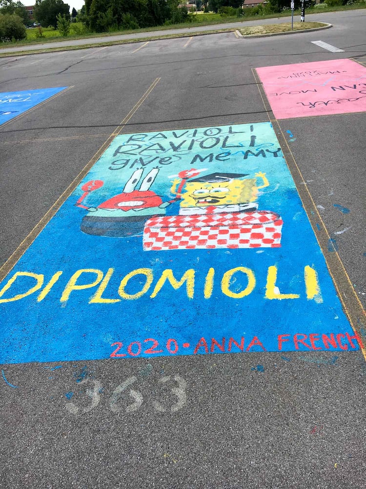 PHOTOS Lakota East seniors paint parking spots